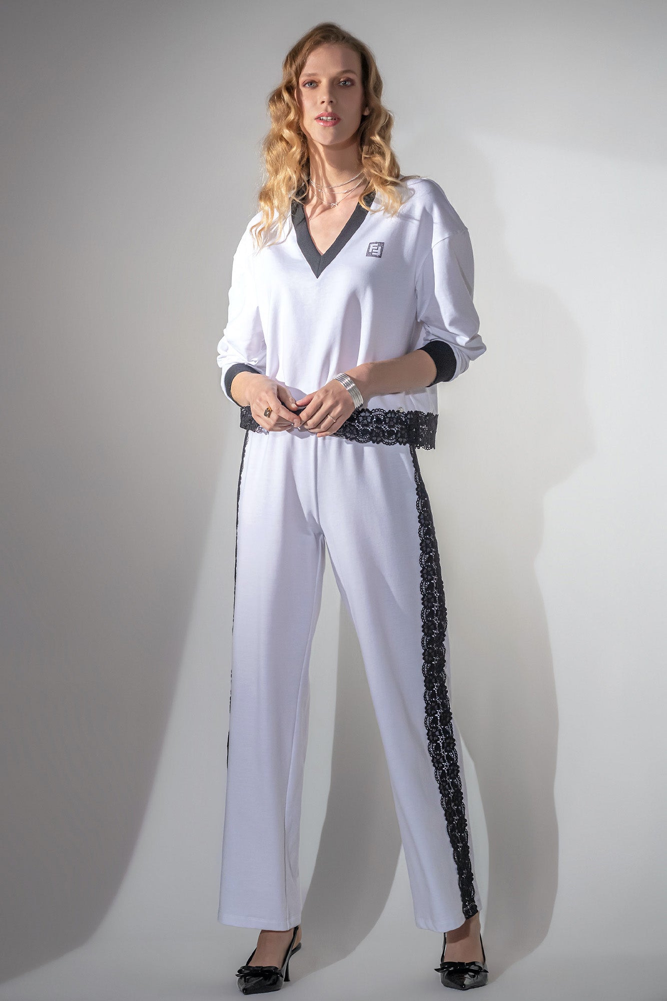 CALÇA MALHA COM FITA RENDA
